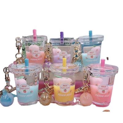 China Souuivenir Cute Animal Bubble Bottles Boba Liquid Quicksand Kawaii Milk Key Chain Bottled Tea Keychains for sale