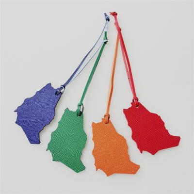 China Central Statistical Leather Hot Sales Saudi Arabia Map Women Genuine Leather Bag Charms Key Chain Accessories for sale