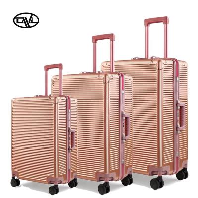 China Aluminum Alloy Waterproof PC Gold PC ABS Rose Spinner Cabin Luggage Suitcase Bag Set for sale