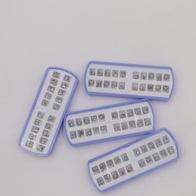 China Mini Acrylic Orthodontic Dental Brackets for sale