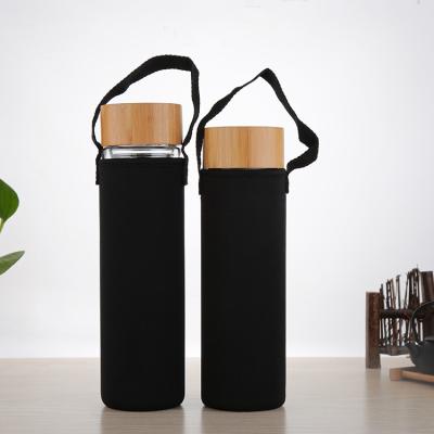 China New Eco Friendly Sustainable Flat Bottom Healthy Glass Water Bottle With Bamboo Mesh Strainer Lid for sale