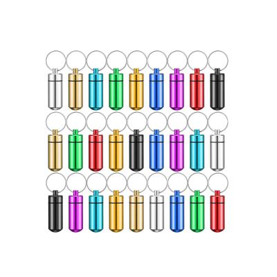 China Daily Portable Aluminum Pill Holders Waterproof Capsule Box Key Chain Mini Storage Drug Container Use Pill Case With Key Chain for sale