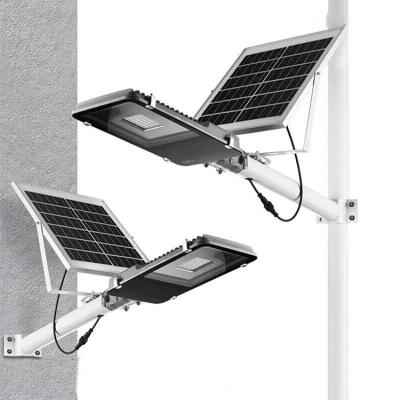 China Light control + radar sensing low voltage bajaj led street light 7000 watt 75watt 70 lumen led street light solar street light set with battery price list for sale