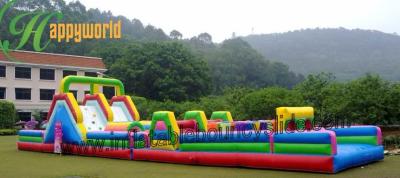 China Alquiler inflable enorme divertido de la carrera de obstáculos con la diapositiva de salto del castillo en venta