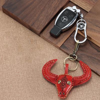 China Fashion/Daily Use Buckle Head Layer Cowhide Leather Key Cartoon Cute Car Door Key Bag Pendant Key Chain for sale