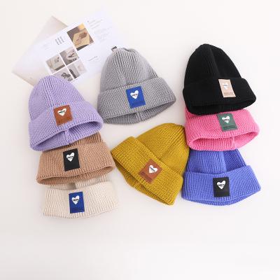 China JOINT Autumn Winter Knit Hat Unisex children's knitted hat beanies fashion fabric piece pattern design hot gift for children Q404 for sale