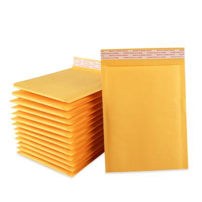 China Custom Yellow Transport Kraft Paper Clothing Envelope Bubble Mailer Mailing Bags for sale