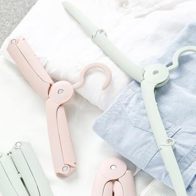 China High Quality Foldable Magic Foldable Clothes Hanger Folding Rack, Nice Cloth Hanger for sale