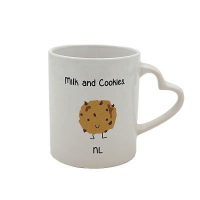 China 11OZ Sublimation White Ceramic Mug Sustainable With Heart Shape Handle Coffee Mug Cup With Printing Cookies for sale