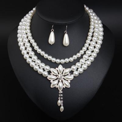 China FASHIONABLE Multilayer Pearl Flower Necklace Earring Set Imitation Pearl Jewelry Sets Pearl Drop Earrings and Necklace Set for Bride for sale