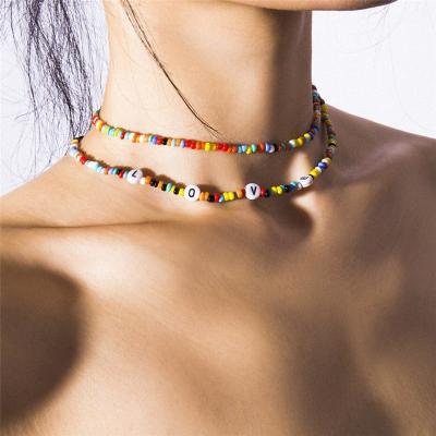 China Pearl FASHIONABLE Bohemian Statement Short Necklace Exaggerated Handmade Multilayer Choker Letter Rice Bead Colorful Necklace for sale