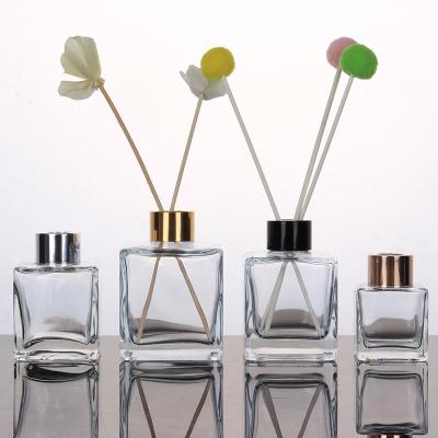 China 200ml Aromatherapy Cosmetic Decorative Bottle With Cap Around Shaped Clear Glass Reed Diffuser Car Room Diffuser Bottle for sale