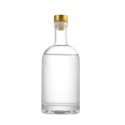 China Sustainable Round 750ml Vodka Spirit Bottle With Rum Cork Gin Liquor Glass Bottle for sale