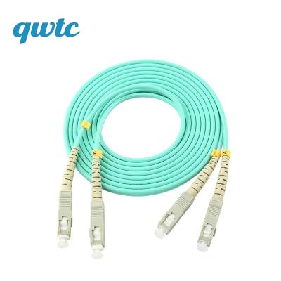 China FTTH Indoor Outdoor Wholesale Customized SC To SC UPC/APC Connector 2 Core Duplex OM3 Indoor Multimode Aqua MM Fiber Optic Patch Cord 2/3/5/10 meters for sale