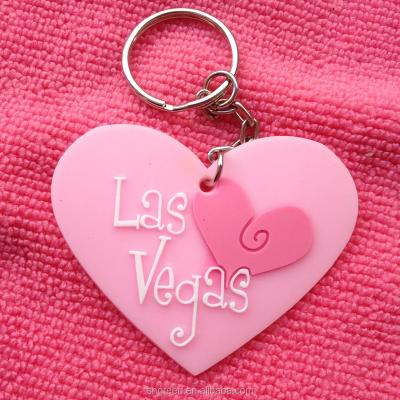 China Lovely Sustainable Pink Rubber Heart Logo 3D Keyholder , Free Design Embossed PVC Keyring for sale