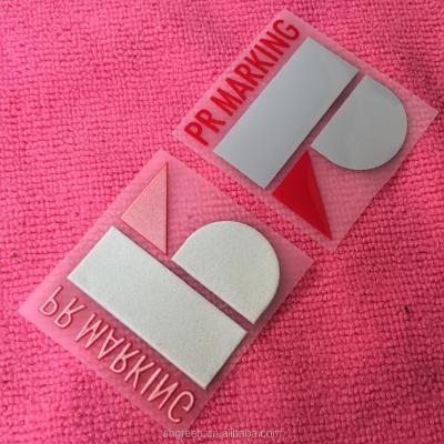 China Lasting perfect hansfeeling 3D embossed hot pressed transfer label, silicone heat transfer label for lady's clothes for sale