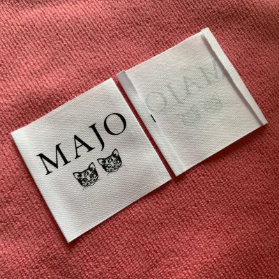 China Sustainable Beautiful Logo Bleached White Cotton Label , End Ply Bleached Cotton Label For Clothing for sale