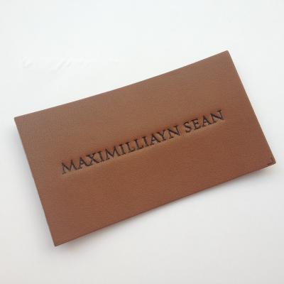 China Viable Direct Manufacturer Custom Lattice Leather Label, High Quality Brand PU Leather Label For Clothing for sale