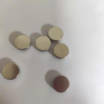 China Custom industrial magnet reasonable price small round n50 rare earth neodymium disc super strong magnetic material buttons for sale