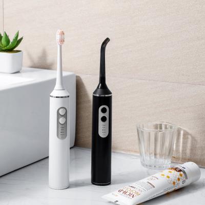 China Water Intake Design Rinser Toothbrush Water Tank External Water Flosser Sonic Electric Toothbrush for sale