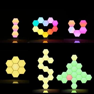 China Modern Dimmable Touch Honeycomb Led Wall Lights DIY Quantum Hexagon Modular Night Light For Home Office Hotel Bar Party Gift for sale