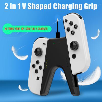 China Ergonomic 2 in1 V-Handle Holder for Switch Series 2 in 1 Grip Handle Grip Bracket V-Shape Charging Holder for Switch Oled Switch Lite NS Nintendo Switch Joy-Con by Nintendo for sale