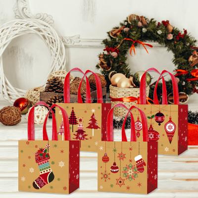 China Xindeli WFF010 4 PCS Recyclable Christmas Tote Gift Non-Woven Bags Reusable With Handles Sweets Candy Treat Bags For Christmas Party Supplies for sale