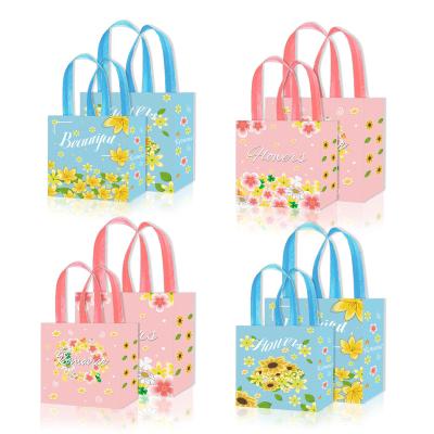 China Xindeli WFF016 Spring Floral Design Sunflower Candy Bags Recyclable Nonwoven Candy Bags Tote Gift Bags For Birthday Party Supplies for sale