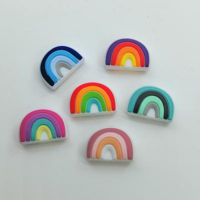 China Eco-friendly Hot selling rainbow shape Eco-friendly 100% Food Grade Silicone tool teether baby toy Soothing Baby's Teething Pain for sale