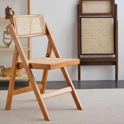 China Wholesale Foldable Cushion Breathable Solid Ash Wooden Garden Cane Black Folding Rattan Dining Chair for sale