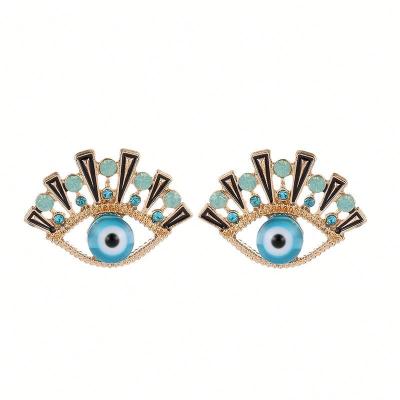 China Lucky Blue Crystal Eyelash Stud Earrings 18k Gold Resin Blue Evil Eyes Earrings for sale