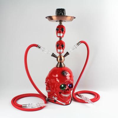 China LED Light Shisha New Design 2 Skull Shaped Hose Led Unique Hookah Resin Chicha Hookahs for sale