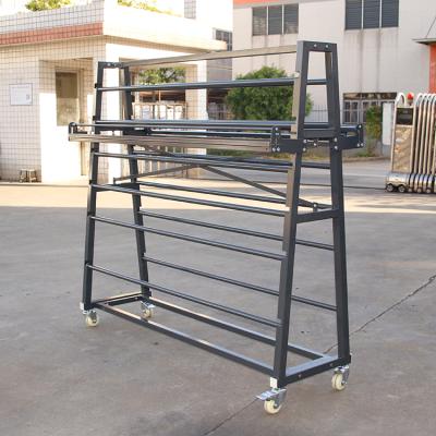 China Idea For Display Fabric Retail Store Ribbon Textiel Covers Roll Up Rack Display Metal Fabric Rolling Display Racks for sale