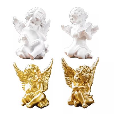 China Europe Custom Reading Angel Sculpture Desktop Decor White Small Angel Statue Souvenir Crafts Resin Gold Angel Figurine for sale