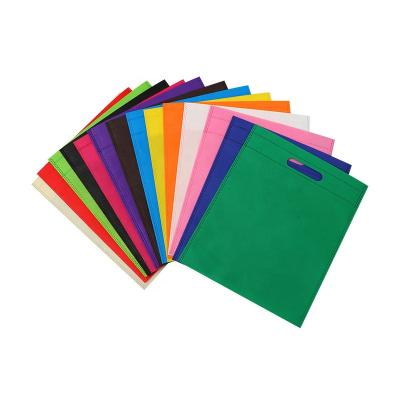 China Hot sale white handled bulk carry bag non woven bags printing pure color non woven dust proof d cut bag for sale