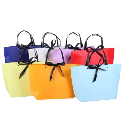 China Recycled materials paper bag high quality recyclable custom handled shopping bag eco paper gift bag for sale