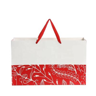 China Eco Friendly Luxury Custom Handled Paper Bag Printing Packaging Shopping Bag for sale