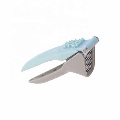 China Sustainable Wholesale Amazon Garlic Tool Crusher PP Handle Stainless Steel Garlic Press for sale