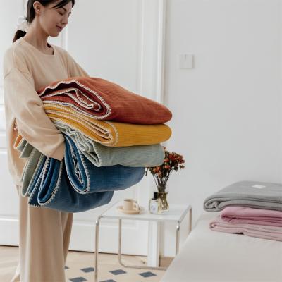 China Folded hot selling stylish and comfortable baby blankets solid color wholesale soft blankets for family for sale