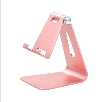 China Universal Aluminum Desktop Mobile Phone and Tablet Holder with Anti-Slip Base and Convenient Charging Port for sale