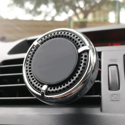 China Perfume new product integrated unique design magnetic car holder, vehicle magnetic holder for sale