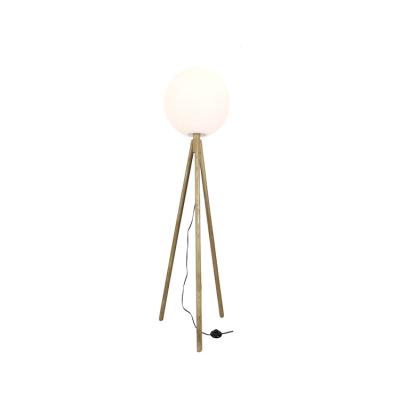 China 2021 design simple wooden tripod spherical white warm outdoor sunset  bedroom floor lamp for sale