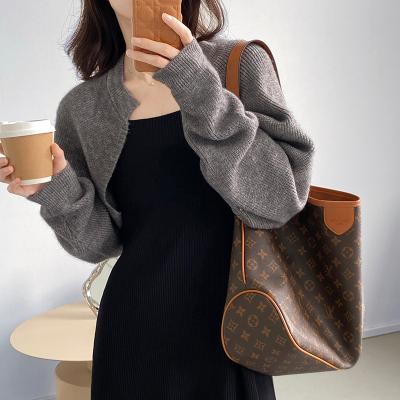 China anti-wrinkle 2022 spring and autumn lantern sleeve retro knitted cardigan loose was thick thin long sleeve shawl sweater women for sale