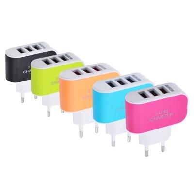 China Mobile Phone Candy 3USB Multi Charger 5V/2A LED USB Smart Luminescent Left Travel Portable Charger for sale