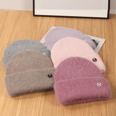 China New OEM Design JOINT Metal Label Knitted Hat Winter Fashion Cool Knitted Wool Hat Beanie Hat for sale