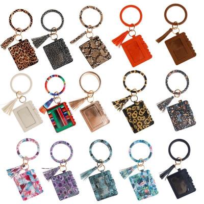 China Mini Leopard-Copy PU Coin Purse Bracelet Key Chain Round Leather Women Key Chain Bracelet Keychain Sandwich Wallet Keychain for sale