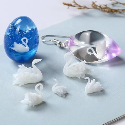 China UV Viable Resin DIY Handmade Jewelry Nail Craft DIY Resin Swan 3D Clear Paper Filling Material for sale