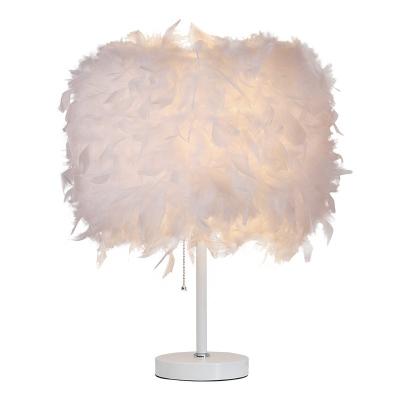 China Modern Nordic simple feather creative table lamp for bedroom baby room decorative modern feather bedside lamp for sale