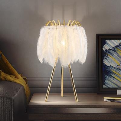 China Modern Nordic Simple Creative Three Leg Feather Table Lamp For Home Warm Decorative Bedroom for sale