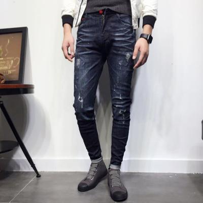 China OEM Black Printed Relaxed Fit Tapered Leg Jeans Pants Blue Casual Style for sale